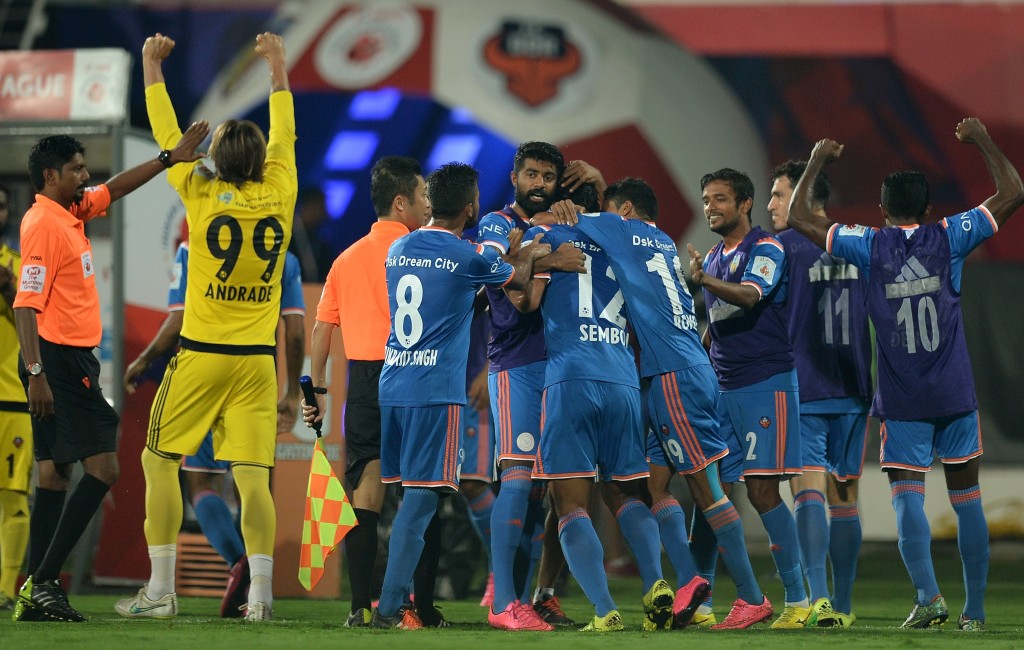 FC Goa players celebrate after a goal during the final match between Chennaiyin FC and FC Goa of the Indian Super League (ISL) football tournament at Jawahar Lal Nehru Stadium in Goa on December 20, 2015. AFP PHOTO / PUNIT PARANJPE / AFP / PUNIT PARANJPE (Photo credit should read PUNIT PARANJPE/AFP/Getty Images)