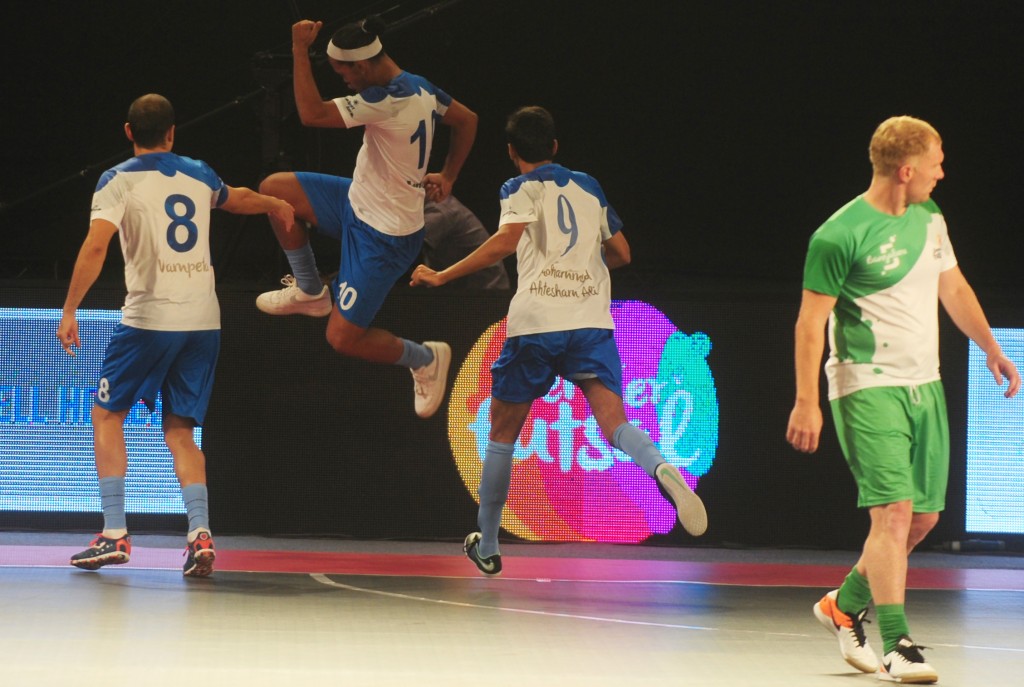 Goa 5's Ronaldhinio (2R) celebrates after scoring a goal against the Bengaluru 5's during their Premier Futsal Football League match in Chennai on July 17, 2016. / AFP / ARUN SANKAR (Photo credit should read ARUN SANKAR/AFP/Getty Images)