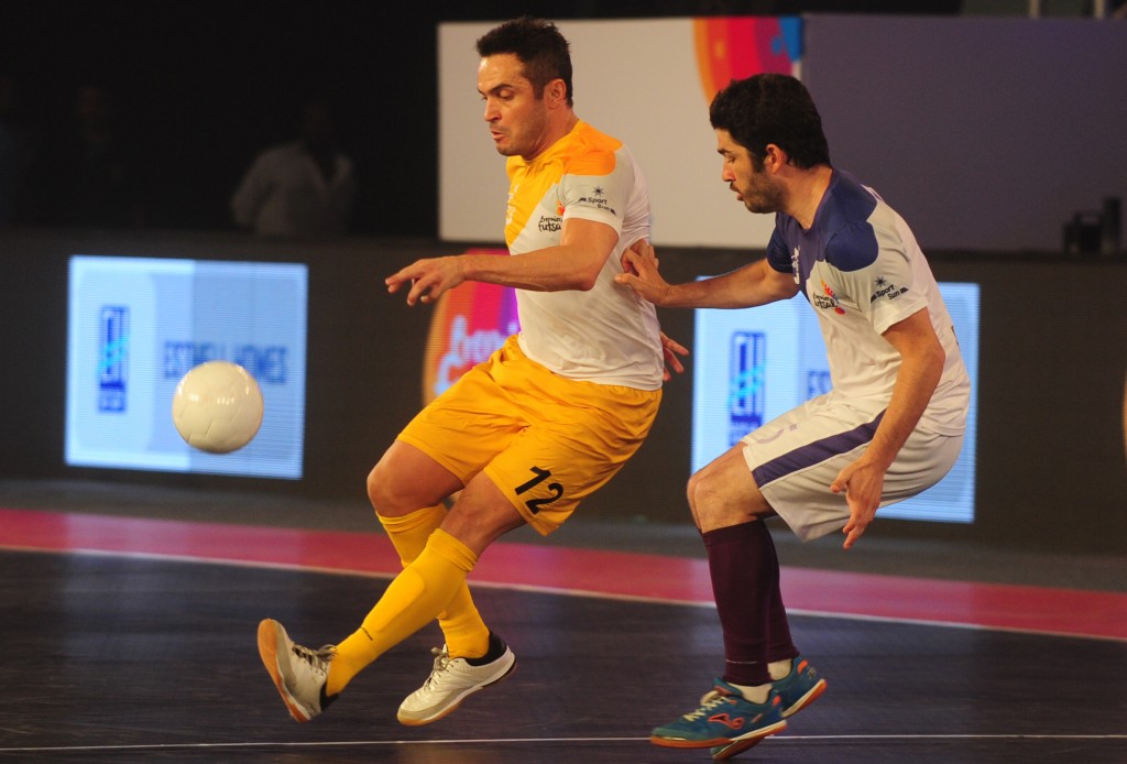 Alessandro Rosa Viera, also known Falcao, from the Chennai 5's plays against the Kochi 5's Gekabert during their Premier Futsal Football League match in Chennai on July 15, 2016 / AFP / ARUN SANKAR (Photo credit should read ARUN SANKAR/AFP/Getty Images)