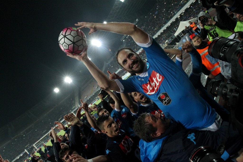 Napoli's Argentinian-French forward Gonzalo Higuain celebrates at the end of the Italian Serie A football match SSC Napoli vs Frosinone Calcio on May 14 2016 at the San Paolo stadium in Naples. Napoli won the match 4-0. / AFP / CARLO HERMANN (Photo credit should read CARLO HERMANN/AFP/Getty Images)