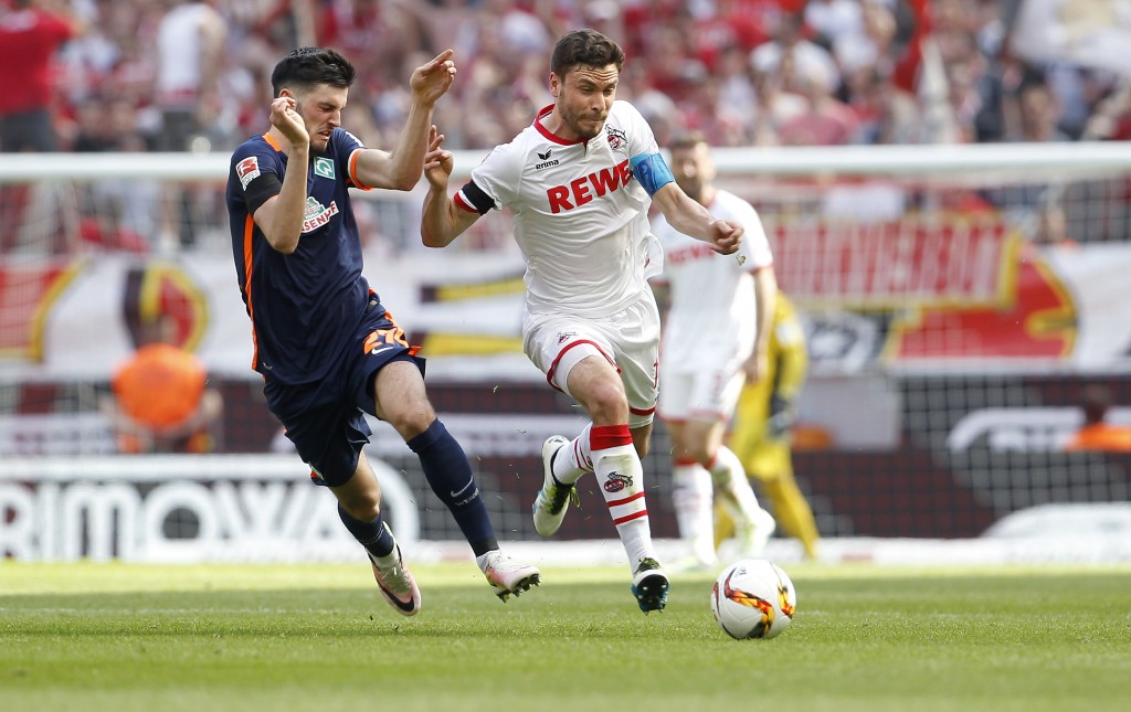 COLOGNE, GERMANY - MAY 07: Jonas Hector of Cologne (R) challenges Florian Grillitsch of Bremen during the Bundesliga match between 1. FC Koeln and Werder Bremen at RheinEnergieStadion on May 7, 2016 in Cologne, Germany. (Photo by Mika Volkmann/Bongarts/Getty Images)