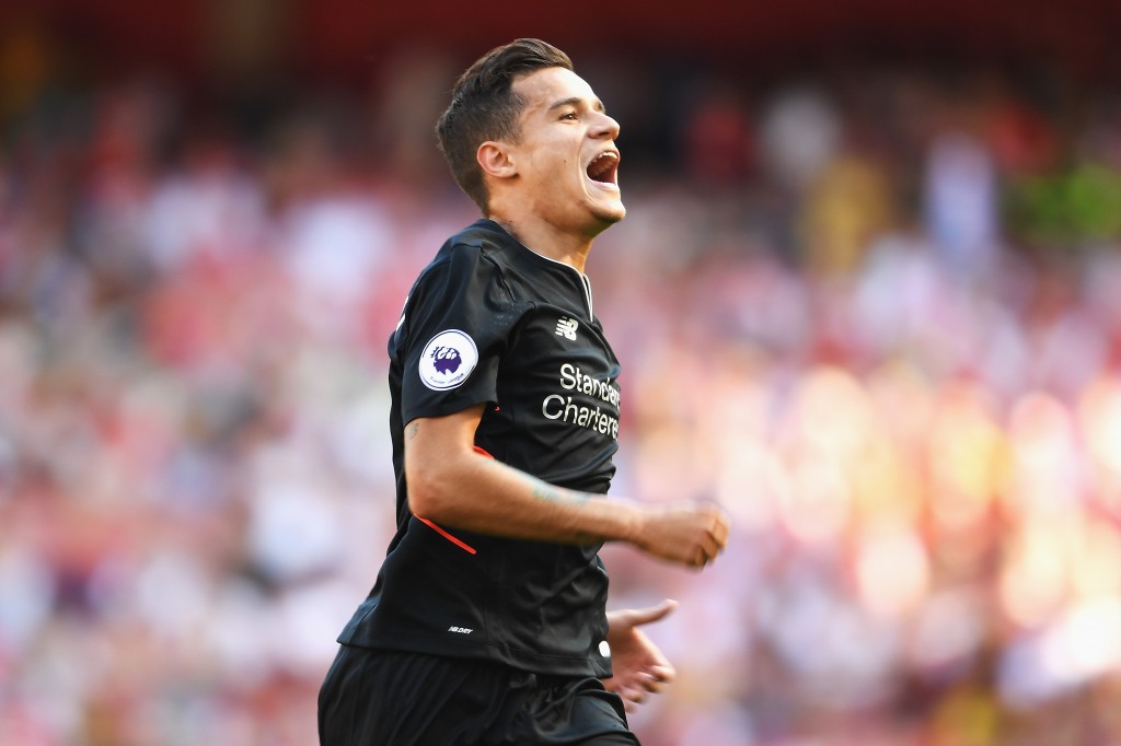 LONDON, ENGLAND - AUGUST 14: Philippe Coutinho of Liverpool celebrates scoring his free kick during the Premier League match between Arsenal and Liverpool at Emirates Stadium on August 14, 2016 in London, England. (Photo by Mike Hewitt/Getty Images)