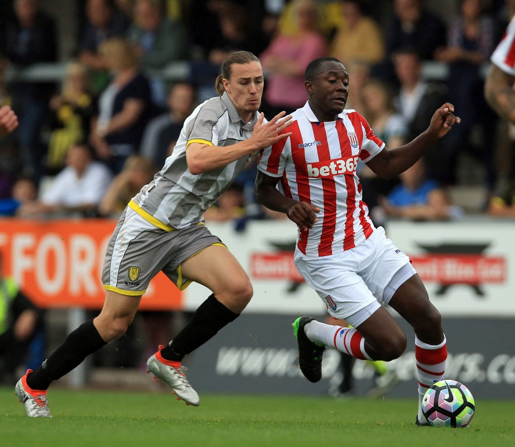 BURTON UPON TRENT, ENGLAND - JULY 16: Jackson Irvine (L) of Burton Albion tackles Gianelli Imbula of Stoke City during the Pre Season Friendly match between Burton Albion and Stoke City at the Pirelli Stadium on July 16, 2016 in Burton upon Albion, England. (Photo by Clint Hughes/Getty Images)