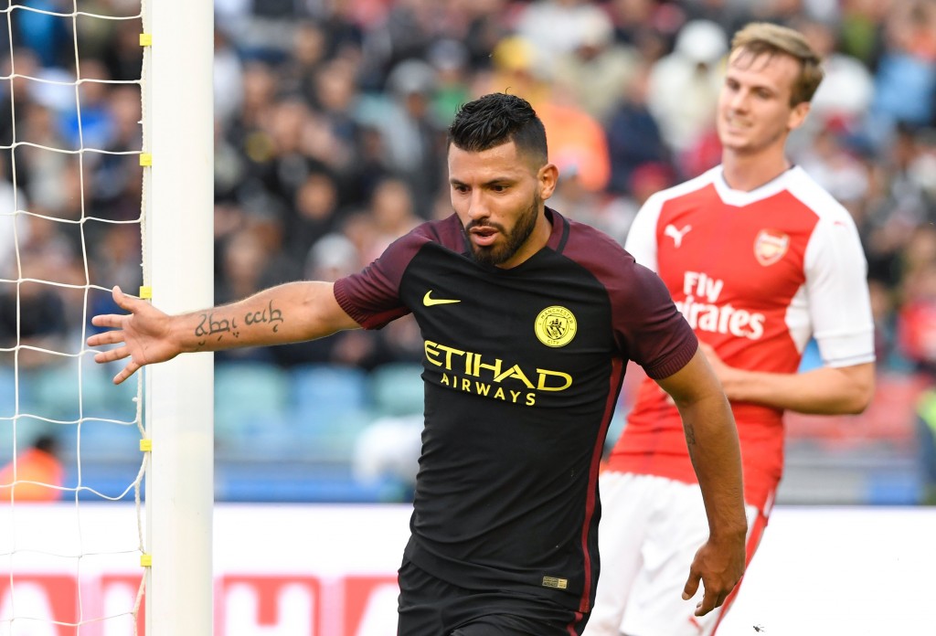 Manchester City's Argentinian forward Sergio Aguero celebrates after scoring during the friendly football match between Arsenal and Manchester City at the Ullevi stadium in Gothenburg on August 7, 2016. / AFP / JONATHAN NACKSTRAND (Photo credit should read JONATHAN NACKSTRAND/AFP/Getty Images)