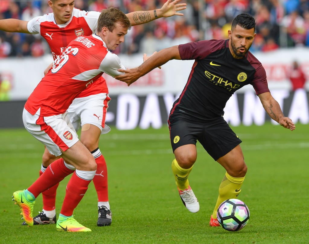 Arsenal's English defender Rob Holding (L) vies with Manchester City's Argentinian forward Sergio Aguero during the friendly football match between Arsenal and Manchester City at the Ullevi stadium in Gothenburg on August 7, 2016. / AFP / JONATHAN NACKSTRAND (Photo credit should read JONATHAN NACKSTRAND/AFP/Getty Images)