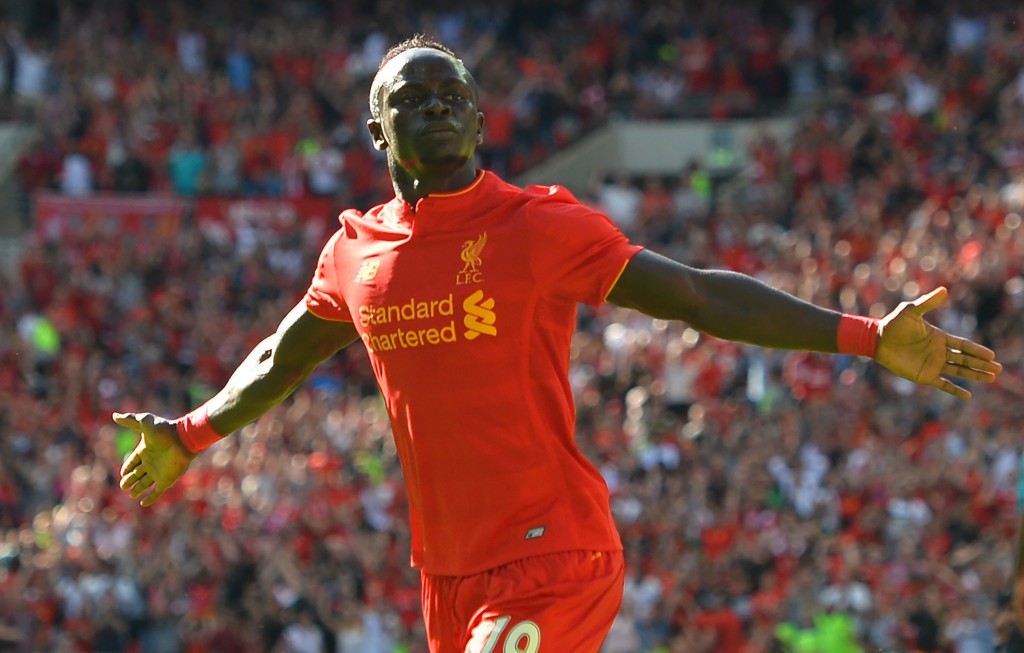 Liverpool's Senegalese midfielder Sadio Mane celebrates after scoring the opening goal of the pre-season International Champions Cup football match between Spanish champions, Barcelona and Liverpool at Wembley stadium in London on August 6, 2016. (Photo by Glyn Kirk/AFP/Getty Images)