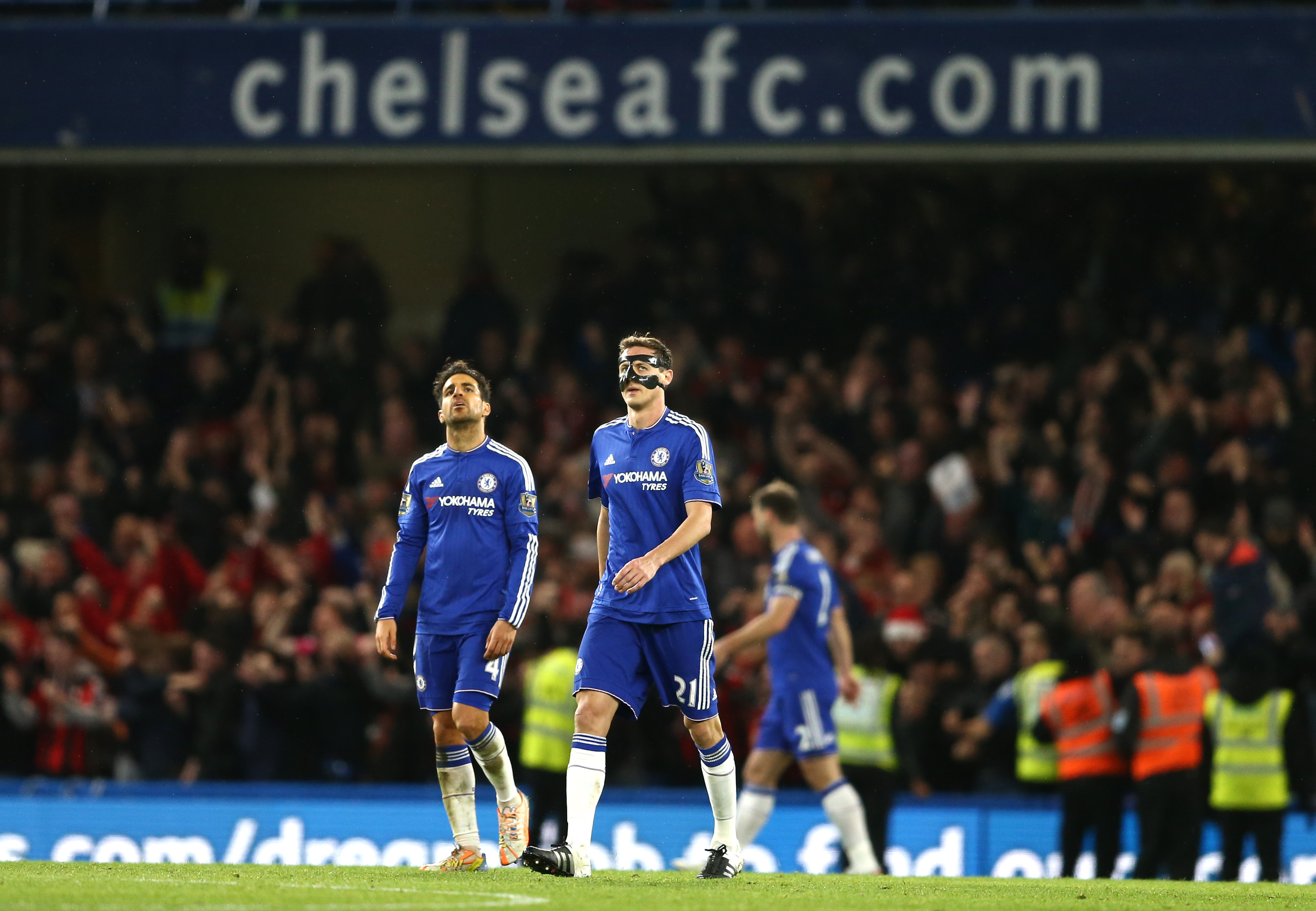 Chelsea's Spanish midfielder Cesc Fabregas and Chelsea's Serbian midfielder Nemanja Matic (R) react after Bournemouth scored during the English Premier League football match between Chelsea and Bournemouth at Stamford Bridge in London on December 5, 2015. AFP PHOTO / JUSTIN TALLIS RESTRICTED TO EDITORIAL USE. No use with unauthorized audio, video, data, fixture lists, club/league logos or 'live' services. Online in-match use limited to 75 images, no video emulation. No use in betting, games or single club/league/player publications. / AFP / JUSTIN TALLIS (Photo credit should read JUSTIN TALLIS/AFP/Getty Images)