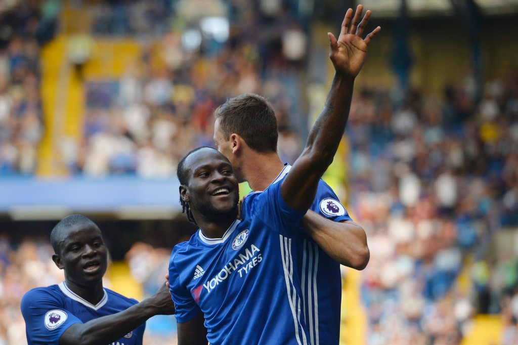 Chelsea's Nigerian midfielder Victor Moses celebrates after scoring during the English Premier League football match between Chelsea and Burnley at Stamford Bridge in London on August 27, 2016. / AFP / GLYN KIRK / RESTRICTED TO EDITORIAL USE. No use with unauthorized audio, video, data, fixture lists, club/league logos or 'live' services. Online in-match use limited to 75 images, no video emulation. No use in betting, games or single club/league/player publications. / (Photo credit should read GLYN KIRK/AFP/Getty Images)