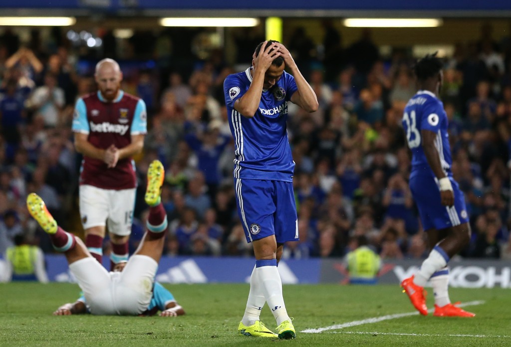 Chelsea's Spanish midfielder Pedro reacts after missing a chance during the English Premier League football match between Chelsea and West Ham United at Stamford Bridge in London on August 15, 2016. / AFP / Justin TALLIS / RESTRICTED TO EDITORIAL USE. No use with unauthorized audio, video, data, fixture lists, club/league logos or 'live' services. Online in-match use limited to 75 images, no video emulation. No use in betting, games or single club/league/player publications. / (Photo credit should read JUSTIN TALLIS/AFP/Getty Images)