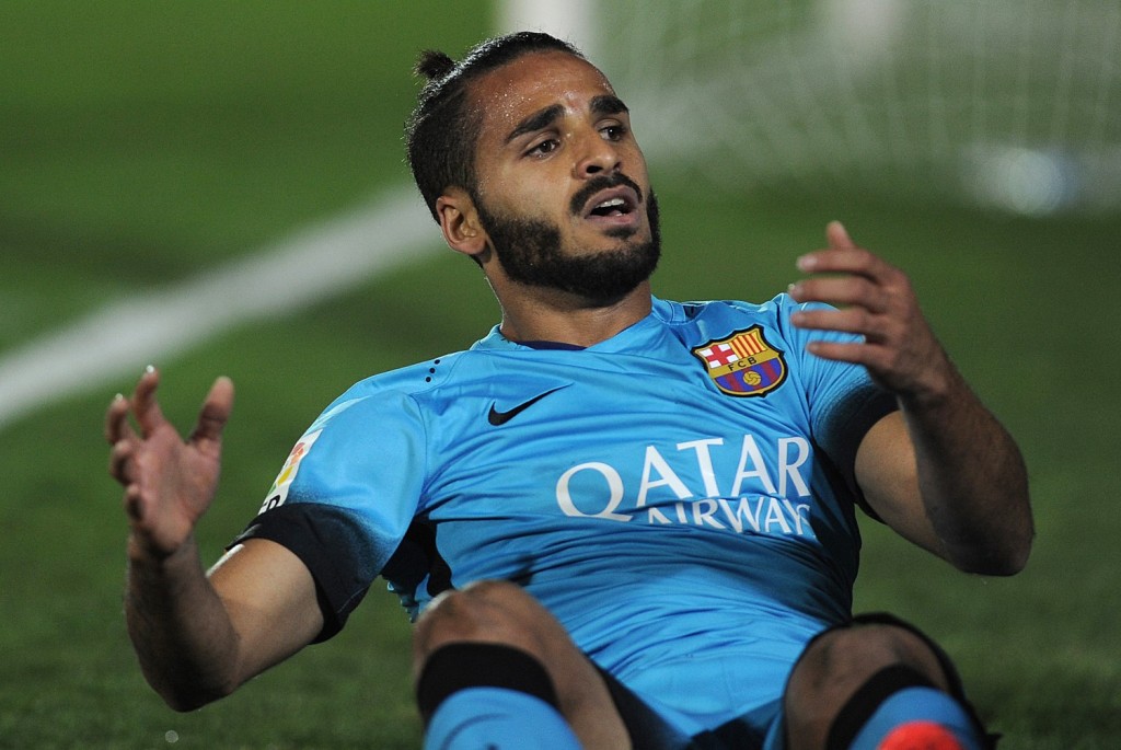 Douglas' time at Barcelona has been extremely disappointing and a move would prove beneficial for the player who has frozen out at Nou Camp. (Picture Courtesy - AFP/Getty Images)