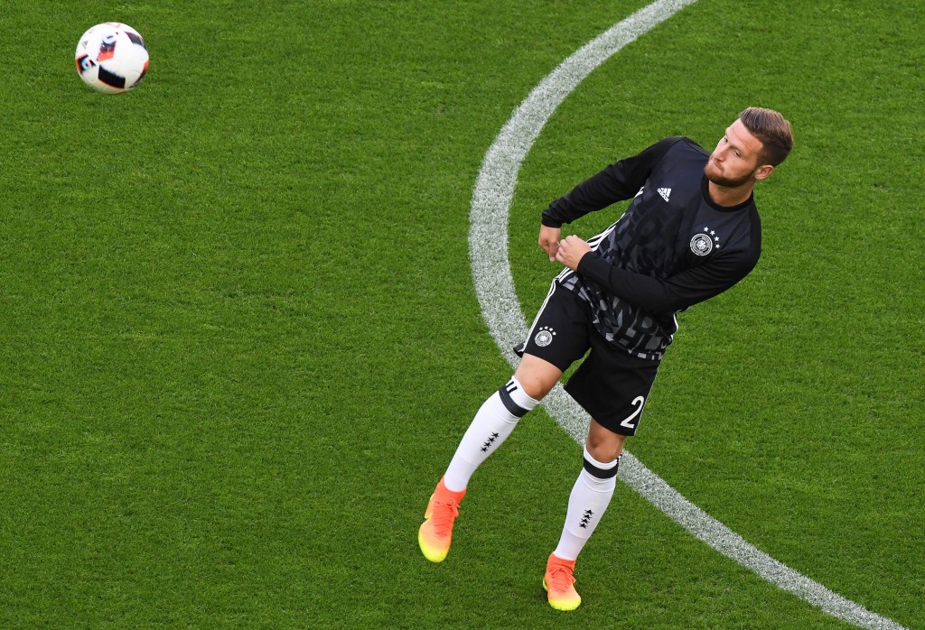 Germany's defender Shkodran Mustafi warms up before the Euro 2016 quarter-final football match between Germany and Italy at the Matmut Atlantique stadium in Bordeaux on July 2, 2016. / AFP / MEHDI FEDOUACH (Photo credit should read MEHDI FEDOUACH/AFP/Getty Images)