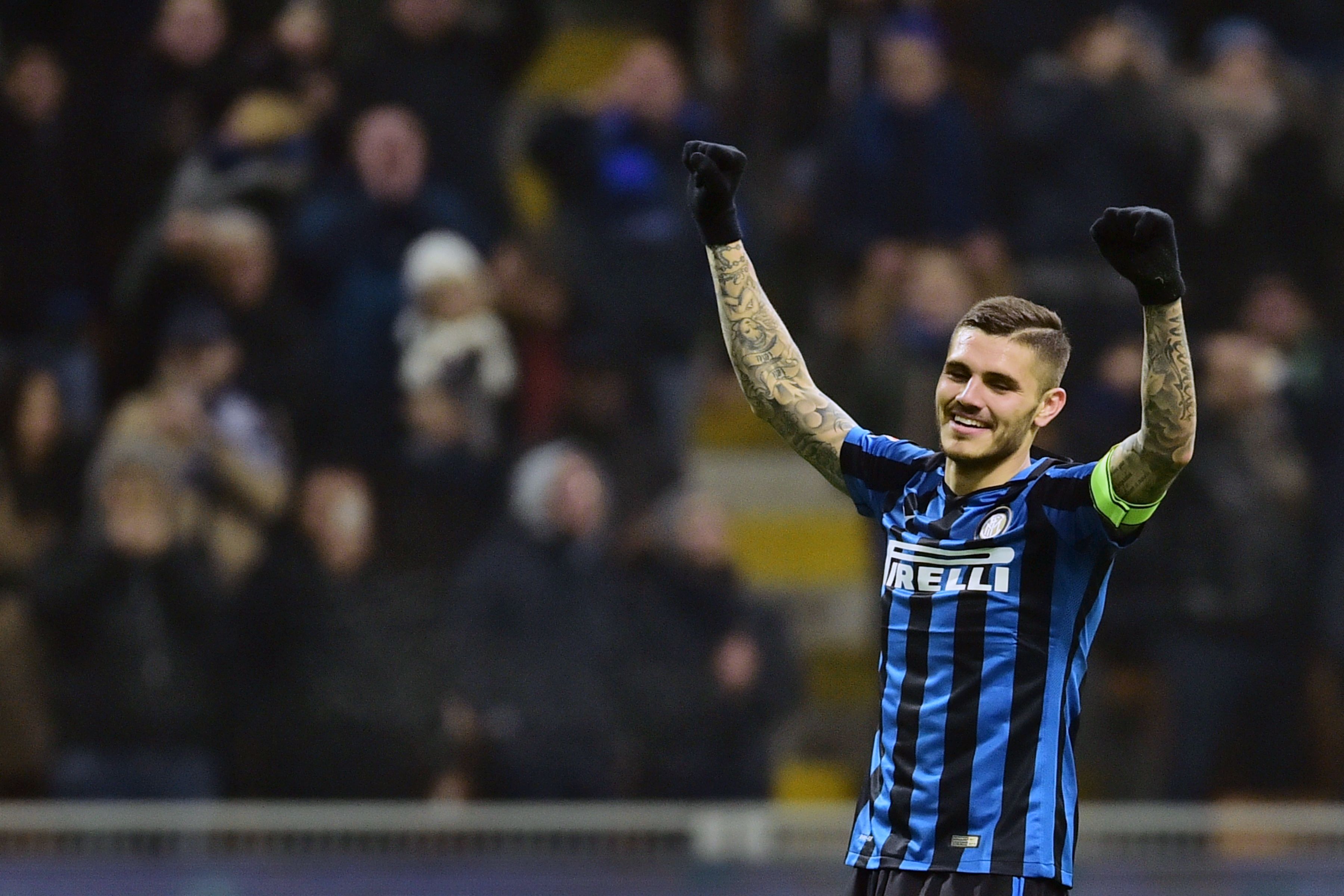 Inter Milan's Argentinian forward Mauro Icardi celebrates after scoring a goal during the Italian Serie A football match Inter Milan vs Palermo at the San Siro Stadium in Milan on March 6, 2016. / AFP / GIUSEPPE CACACE (Photo credit should read GIUSEPPE CACACE/AFP/Getty Images)