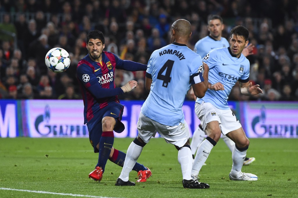 BARCELONA, SPAIN - MARCH 18: Luis Suarez of FC Barcelona shoots towards goal during the UEFA Champions League round of 16 second leg match between FC Barcelona and Manchester City at the Camp Nou stadium on March 18, 2015 in Barcelona, Spain. (Photo by David Ramos/Getty Images)