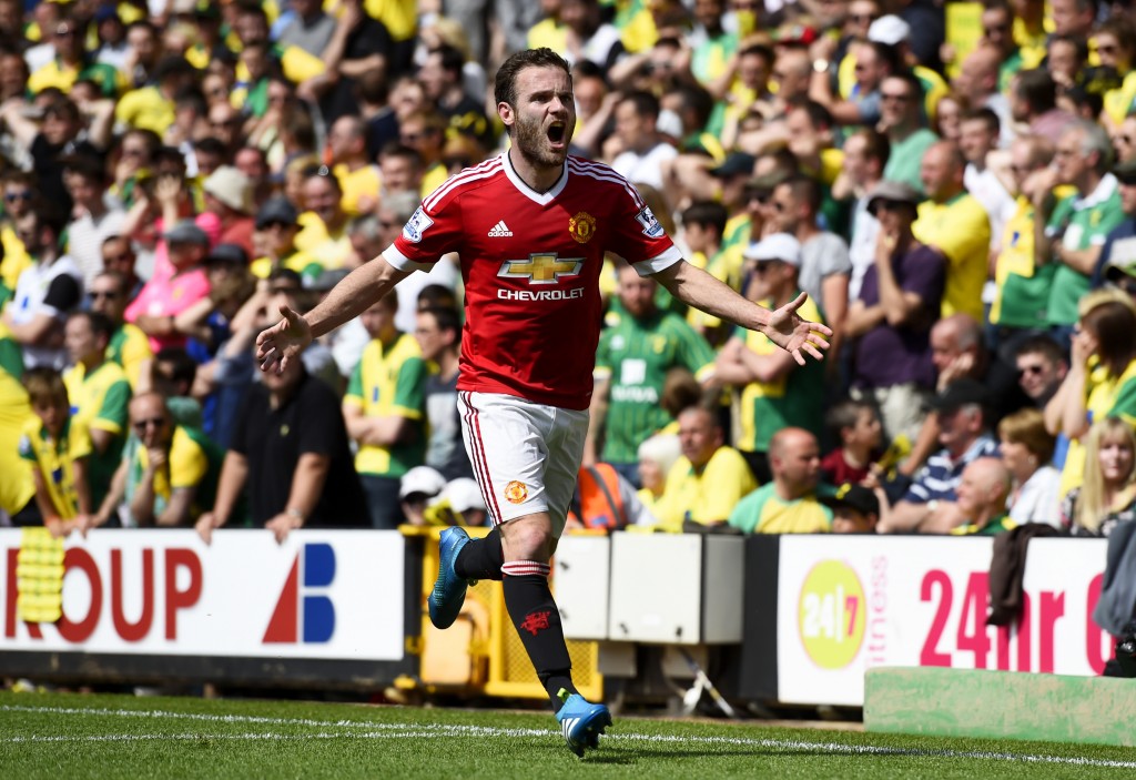 NORWICH, ENGLAND - MAY 07: Juan Mata of Manchester United celebrates scoring his team's first goal during the Barclays Premier League match between Norwich City and Manchester United at Carrow Road on May 7, 2016 in Norwich, England. (Photo by Mike Hewitt/Getty Images)