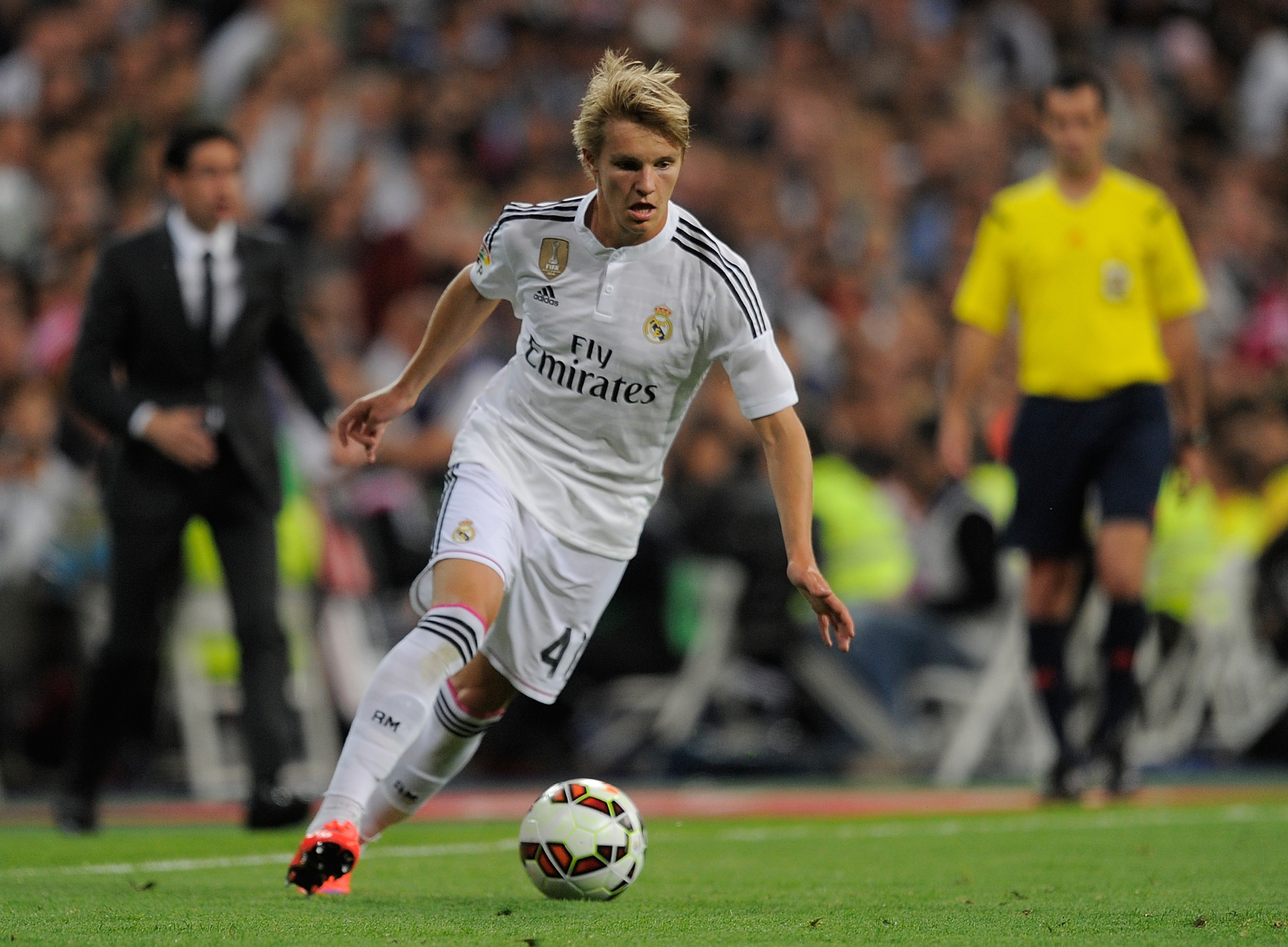 Ødegaard showed signs of better things to come in his first competitive start for Madrid. (Picture Courtesy - AFP/Getty Images)