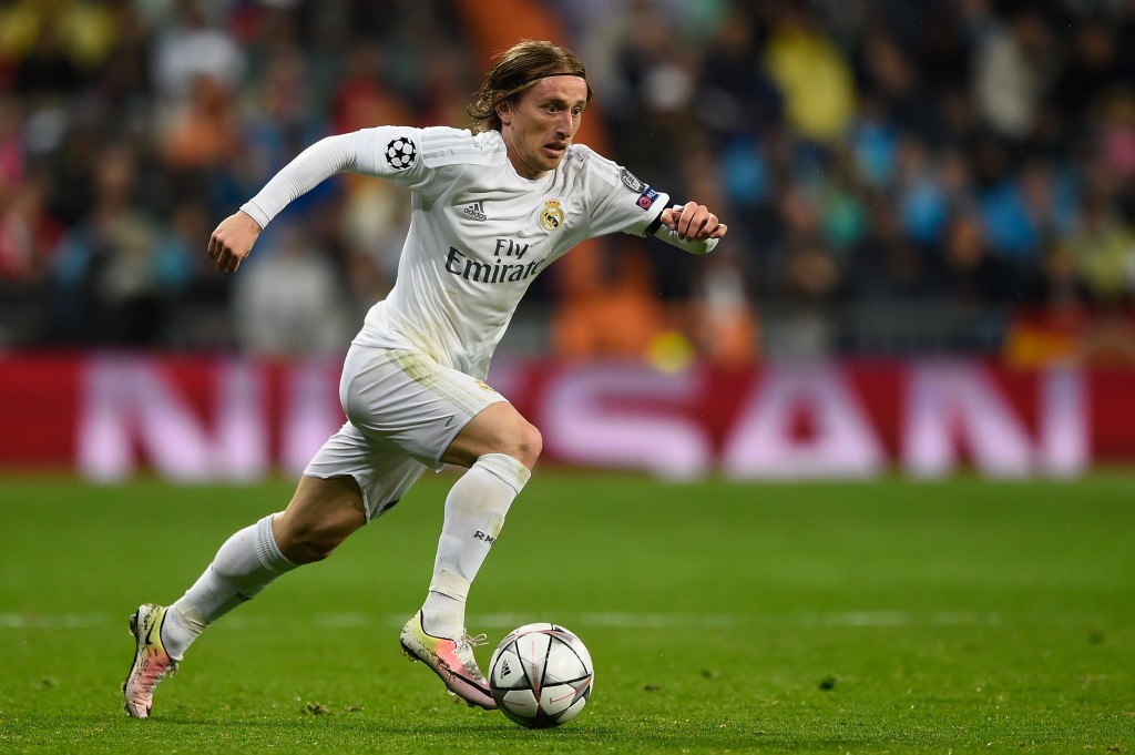 MADRID, SPAIN - APRIL 12: Luka Modric of Real Madrid in action during the UEFA Champions League quarter final second leg match between Real Madrid CF and VfL Wolfsburg at Estadio Santiago Bernabeu on April 12, 2016 in Madrid, Spain. (Photo by Mike Hewitt/Getty Images)