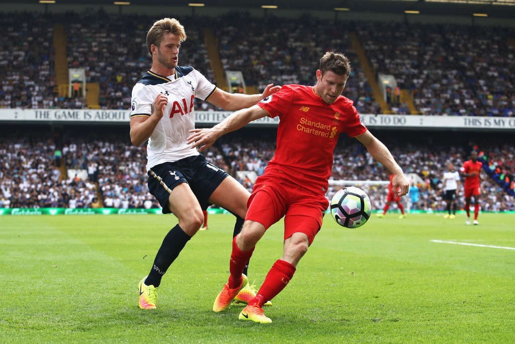 LONDON, ENGLAND - AUGUST 27: Eric Dier of Tottenham Hotspur (L) and James Milner of Liverpool (R) battle for possession during the Premier League match between Tottenham Hotspur and Liverpool at White Hart Lane on August 27, 2016 in London, England. (Photo by Julian Finney/Getty Images)