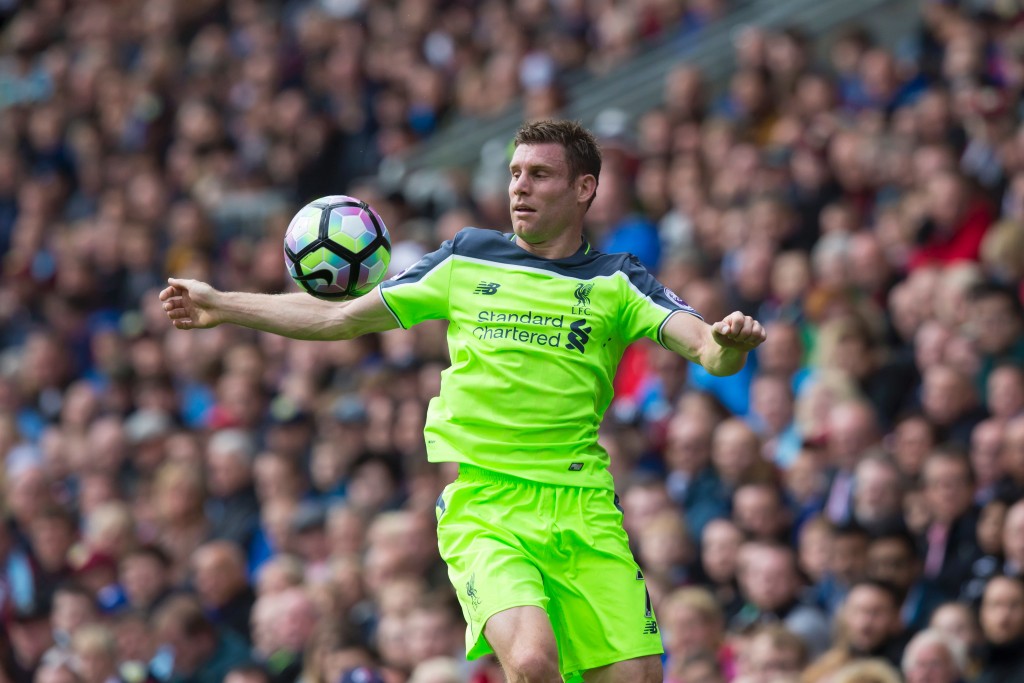 Liverpool's English midfielder James Milner controls the ball during the English Premier League football match between Burnley and Liverpool at Turf Moor in Burnley, north west England on August 20, 2016. / AFP / JON SUPER / RESTRICTED TO EDITORIAL USE. No use with unauthorized audio, video, data, fixture lists, club/league logos or 'live' services. Online in-match use limited to 75 images, no video emulation. No use in betting, games or single club/league/player publications.  /         (Photo credit should read JON SUPER/AFP/Getty Images)