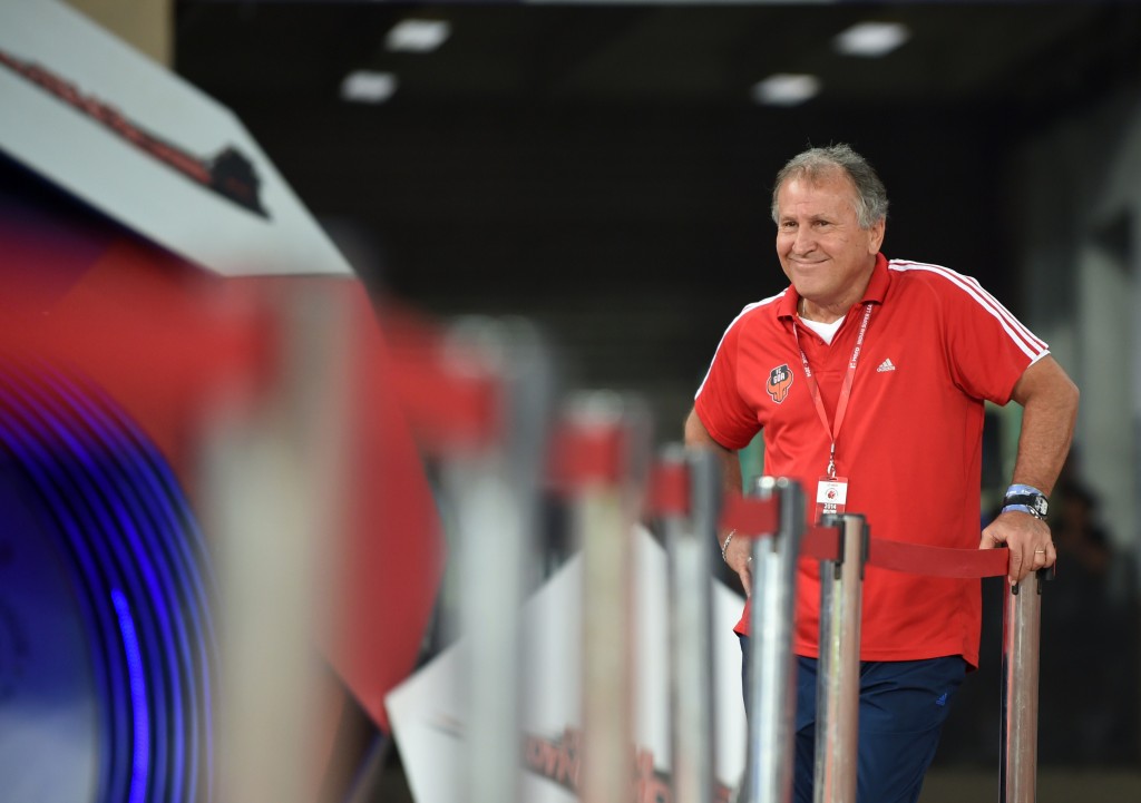 TO GO WITH Fbl-IND-ISL,FOCUS by Trudy Harris In this photograph taken on November 13, 2014, FC Goa football coach Zico watches play during during the India Super League match against Delhi Dynamos FC in New Delhi. Just five weeks after a glitzy kickoff, India's fledgling football league claims to be the most popular in Asia -- even if the quality of matches and performances of its ageing stars have left fans underwhelmed. AFP PHOTO / SAJJAD HUSSAIN (Photo credit should read SAJJAD HUSSAIN/AFP/Getty Images)