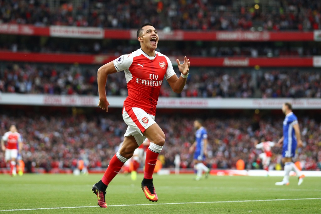 LONDON, ENGLAND - SEPTEMBER 24: Alexis Sanchez of Arsenal celebrates scoring his sides first goal during the Premier League match between Arsenal and Chelsea at the Emirates Stadium on September 24, 2016 in London, England. (Photo by Paul Gilham/Getty Images)