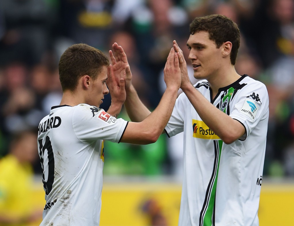 MOENCHENGLADBACH, GERMANY - APRIL 03: Thorgan Hazard of Borussia Moenchengladbach (L) celebrates with Andreas Christensen as he scores their fourth goal during the Bundesliga match between Borussia Moenchengladbach and Hertha BSC at Borussia-Park on April 3, 2016 in Moenchengladbach, Germany. (Photo by Stuart Franklin/Bongarts/Getty Images)