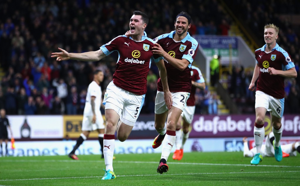 BURNLEY, ENGLAND - SEPTEMBER 26: Michael Keane of Burnley (L) celebrates scoring his sides second goal with team George Boyd of Burnley (R) during the Premier League match between Burnley and Watford at Turf Moor on September 26, 2016 in Burnley, England. (Photo by Clive Brunskill/Getty Images)