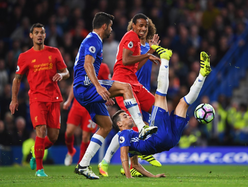 LONDON, ENGLAND - SEPTEMBER 16: Oscar of Chelsea makes a spectacular attempt to reach the ball during the Premier League match between Chelsea and Liverpool at Stamford Bridge on September 16, 2016 in London, England. (Photo by Shaun Botterill/Getty Images)