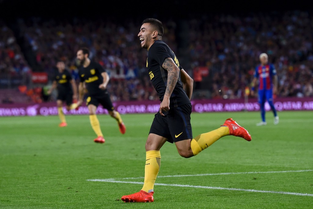 Atletico Madrid's Argentinian forward Angel Correa celebrates his goal during the Spanish league football match FC Barcelona vs Atletico de Madrid at the Camp Nou stadium in Barcelona on September 21, 2016. / AFP / JOSEP LAGO (Photo credit should read JOSEP LAGO/AFP/Getty Images)