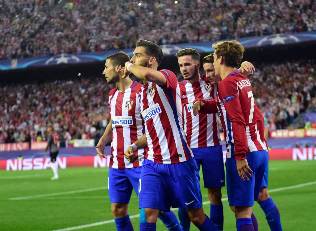 Atletico Madrid's Belgian midfielder Yannick Ferreira Carrasco (2ndL) celebrates with teammates after scoring during the UEFA Champions League Group D football match Club Atletico de Madrid vs FC Bayern Munich at the Vicente Calderon stadium in Madrid on September 28, 2016. / AFP / PIERRE-PHILIPPE MARCOU (Photo credit should read PIERRE-PHILIPPE MARCOU/AFP/Getty Images)