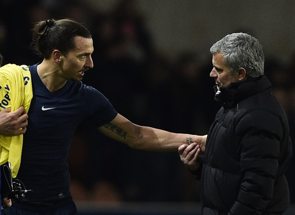 Paris Saint-Germain's Swedish midfielder Zlatan Ibrahimovic speaks with Chelsea's Portuguese manager Jose Mourinho (R) at the end of the UEFA Champions League round of 16 football match between Paris Saint-Germain (PSG) and Chelsea at the Parc des Princes stadium in Paris on February 17, 2015. AFP PHOTO / FRANCK FIFE (Photo credit should read FRANCK FIFE/AFP/Getty Images)