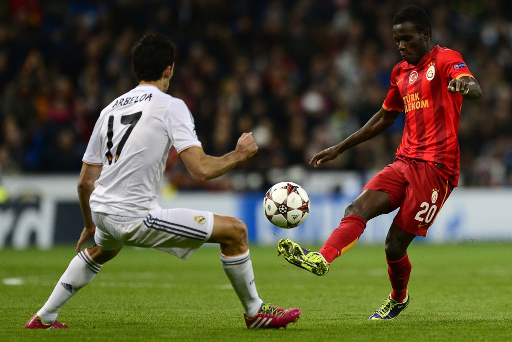Galatasaray's Portuguese midfielder Bruma (R) vies with Real Madrid's defender Alvaro Arbeloa during the UEFA Champions League football match Real Madrid CF vs Galatasaray SK at the Santiago Bernabeu stadium in Madrid on November 27, 2013. AFP PHOTO/ JAVIER SORIANO (Photo credit should read JAVIER SORIANO/AFP/Getty Images)