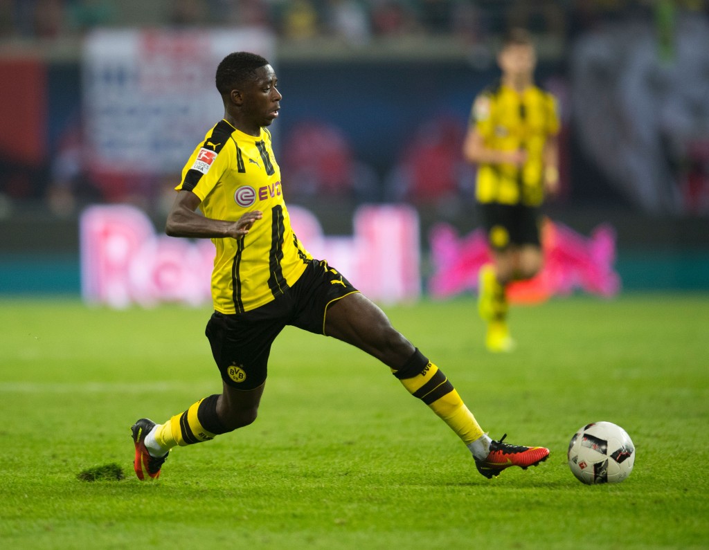 Dortmund's French midfielder Ousmane Dembele plays the ball during the German first division Bundesliga football match between RB Leipzig and BVB Borrusia Dortmund in Leipzig, eastern Germany on September 10, 2016. / AFP / ROBERT MICHAEL (Photo credit should read ROBERT MICHAEL/AFP/Getty Images)