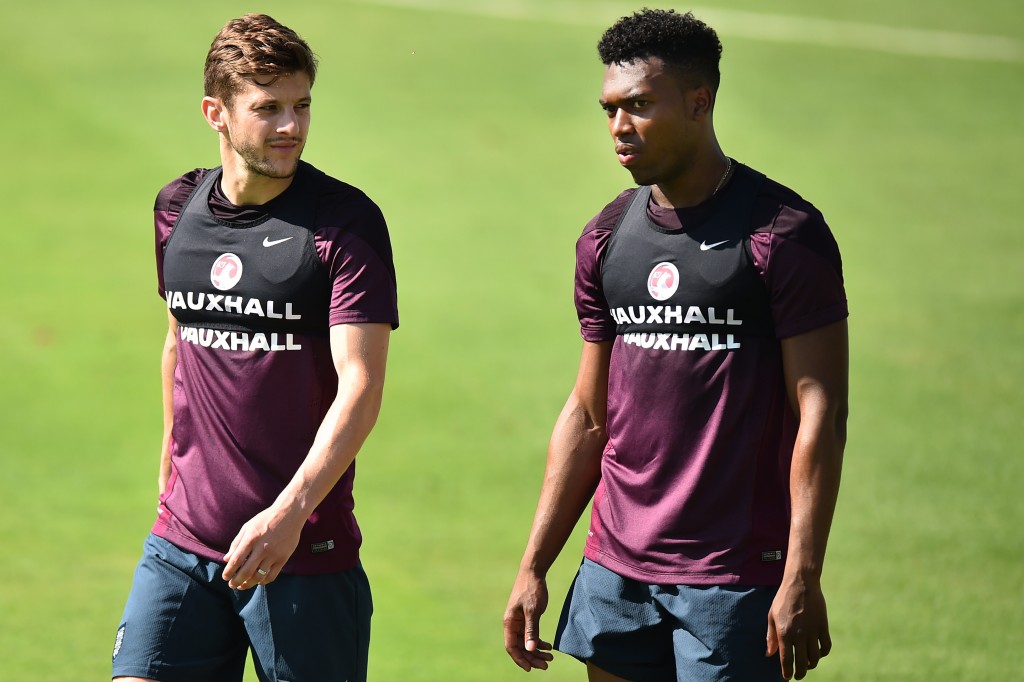 England's midfielder Adam Lallana (L) and England's forward Daniel Sturridge (R) take part in a training session at the Urca military base in Rio de Janeiro on June 9, 2014, ahead of the 2014 FIFA World Cup in Brazil. AFP PHOTO / BEN STANSALL (Photo credit should read BEN STANSALL/AFP/Getty Images)