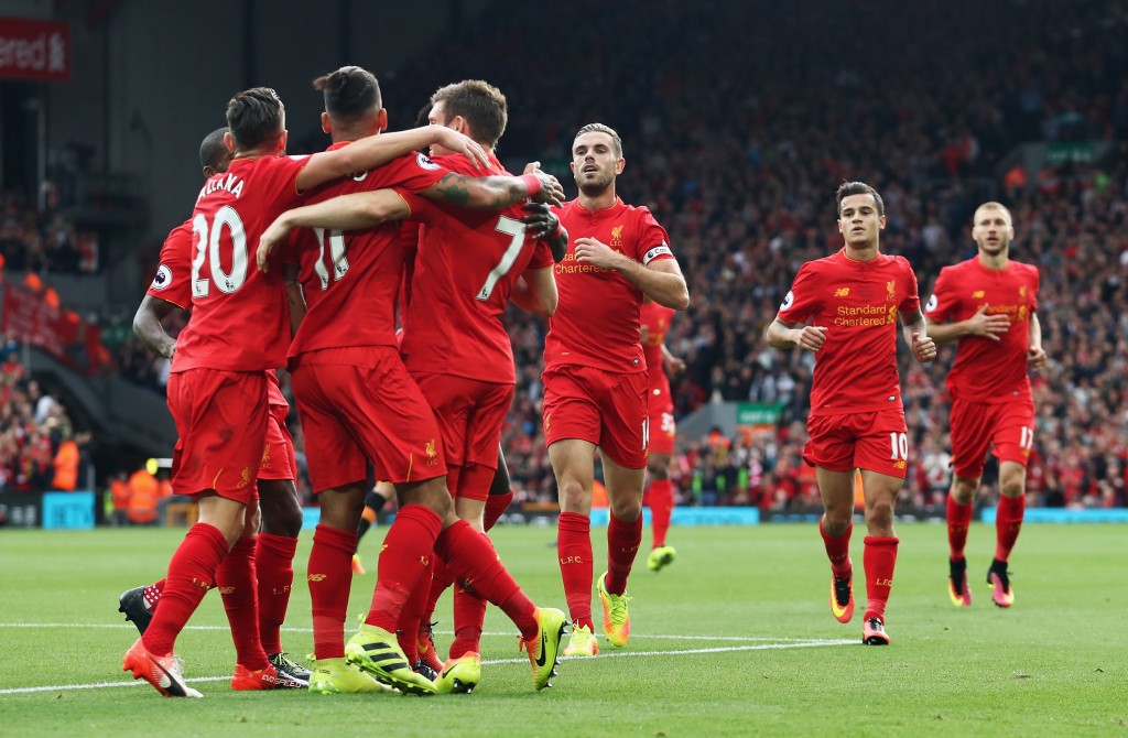 LIVERPOOL, ENGLAND - SEPTEMBER 24: James Milner of Liverpool (7) celebrates scoring his sides second goal with team mates during the Premier League match between Liverpool and Hull City at Anfield on September 24, 2016 in Liverpool, England. (Photo by Julian Finney/Getty Images)