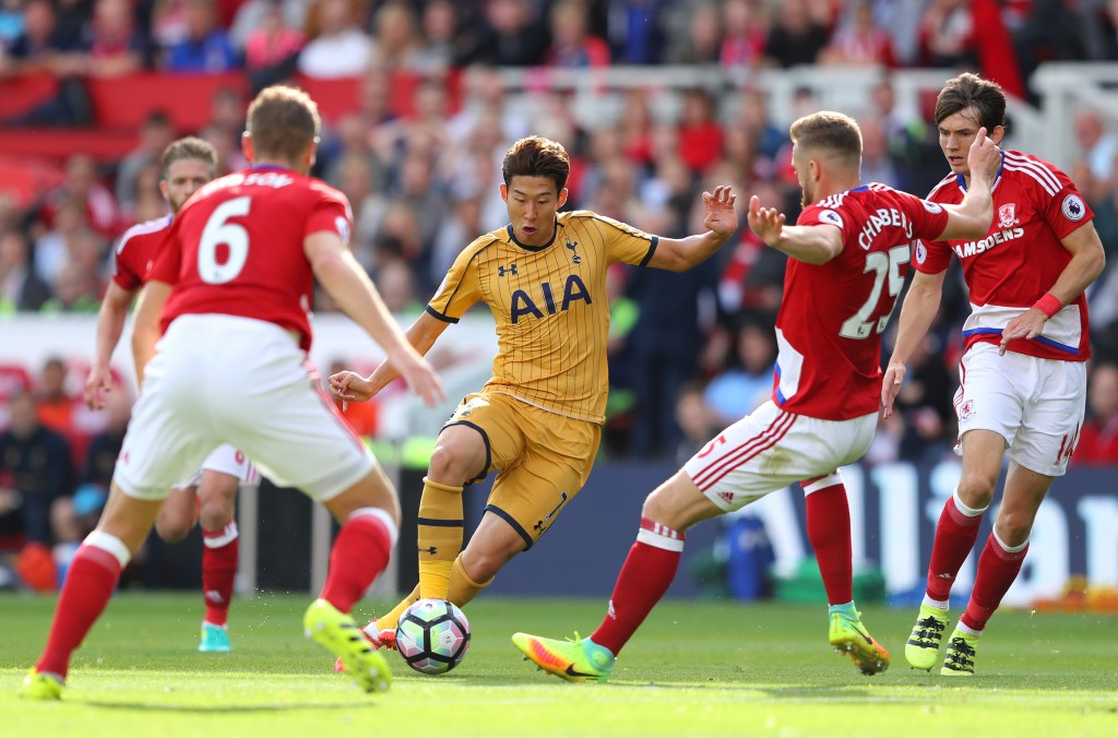MIDDLESBROUGH, ENGLAND - SEPTEMBER 24: Heung-Min Son of Tottenham Hotspur takes on the Middlesbrough defence during the Premier League match between Middlesbrough and Tottenham Hotspur at the Riverside Stadium on September 24, 2016 in Middlesbrough, England. (Photo by Richard Heathcote/Getty Images)