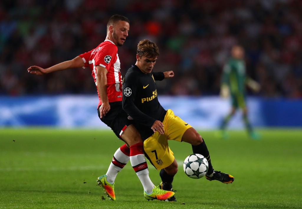 EINDHOVEN, NETHERLANDS - SEPTEMBER 13: Bart Ramselaar of PSV Eindhoven and Antoine Griezmann of Atletico Madrid in action during the UEFA Champions League Group D match between PSV Eindhoven and Club Atletico de Madrid at Philips Stadion on September 13, 2016 in Eindhoven, Netherlands . (Photo by Dean Mouhtaropoulos/Getty Images)