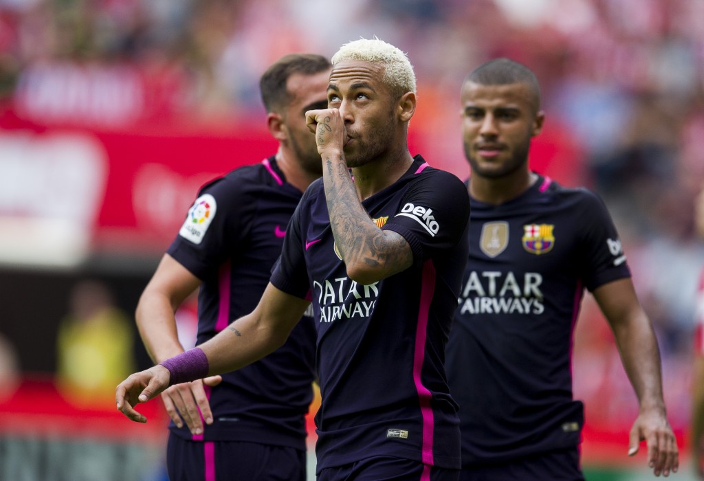 GIJON, SPAIN - SEPTEMBER 24: Neymar of FC Barcelona celebrates after scoring his team's third goal during the La Liga match between Real Sporting de Gijon and FC Barcelona at Estadio El Molinon on September 24, 2016 in Gijon, Spain. (Photo by Juan Manuel Serrano Arce/Getty Images)