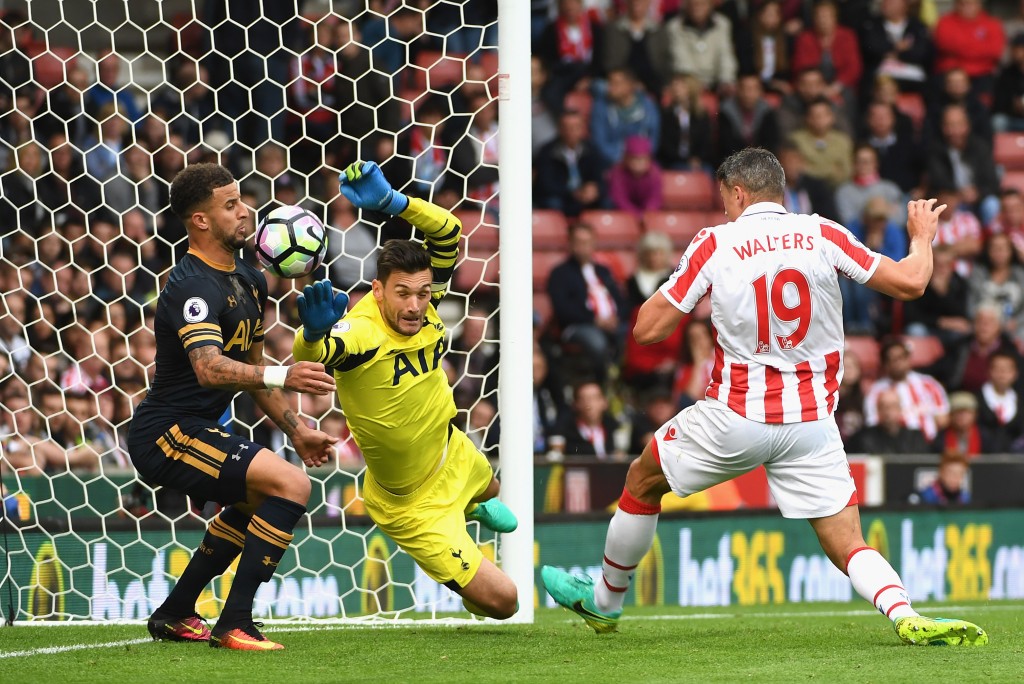STOKE ON TRENT, ENGLAND - SEPTEMBER 10: Kyle Walker of Tottenham Hotspur clears Jonathan Walters of Stoke City (R) shot off the line during the Premier League match between Stoke City and Tottenham Hotspur at Britannia Stadium on September 10, 2016 in Stoke on Trent, England. (Photo by Ross Kinnaird/Getty Images)