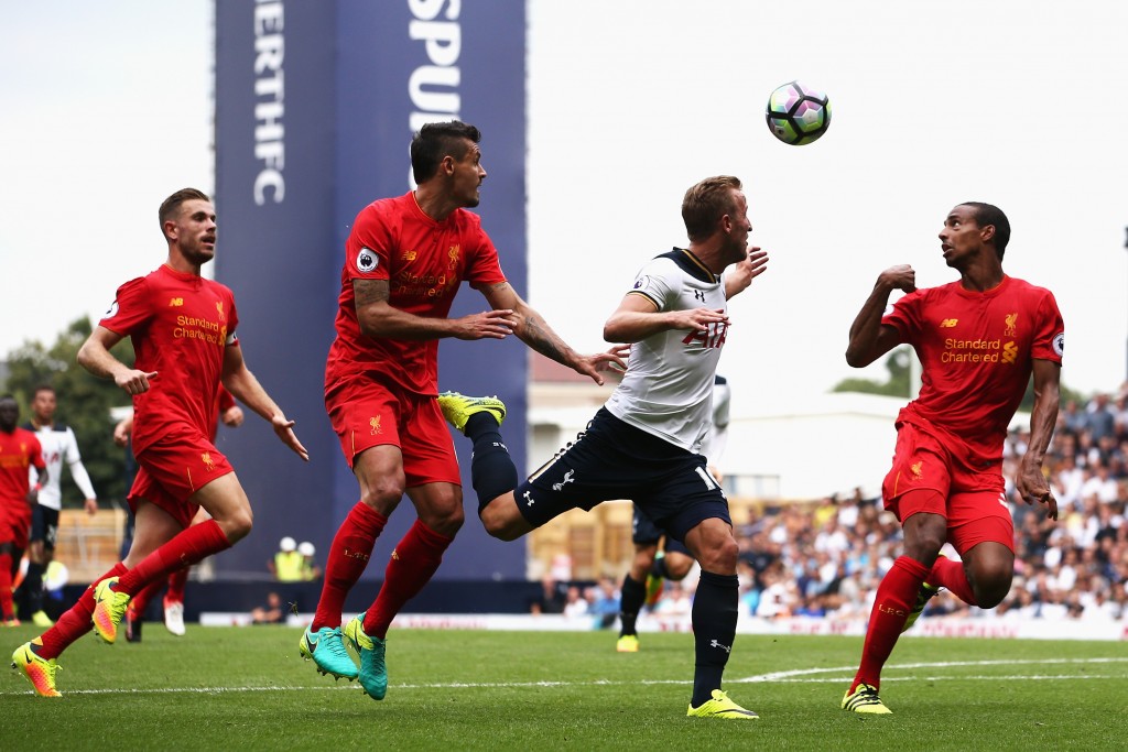 LONDON, ENGLAND - AUGUST 27: Harry Kane of Tottenham Hotspur (C), Dejan Lovren of Liverpool (L) and Joel Matip of Liverpool all watch the ball during the Premier League match between Tottenham Hotspur and Liverpool at White Hart Lane on August 27, 2016 in London, England. (Photo by Jan Kruger/Getty Images)