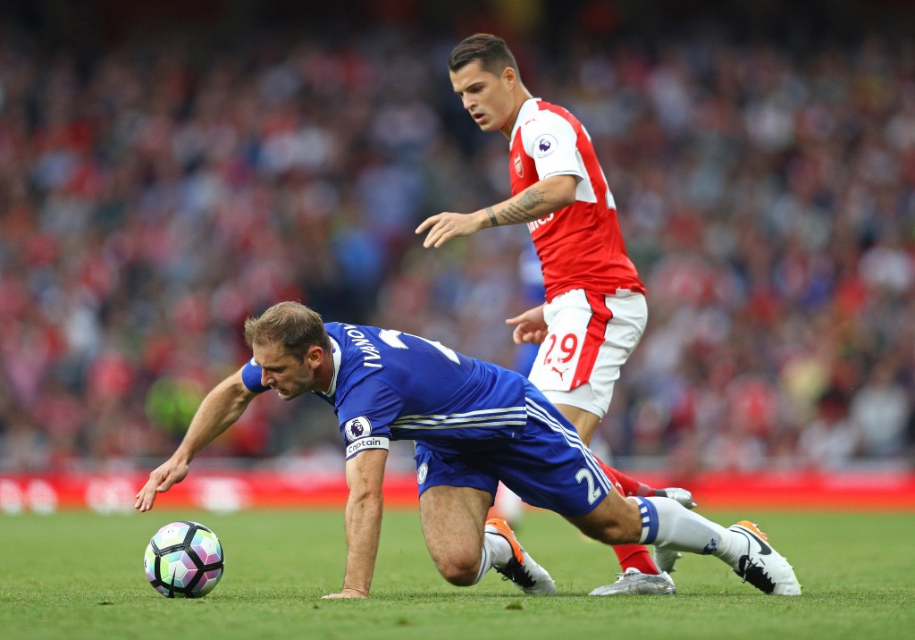LONDON, ENGLAND - SEPTEMBER 24: Branislav Ivanovic of Chelsea is fouled by Granit Xhaka of Arsenal during the Premier League match between Arsenal and Chelsea at the Emirates Stadium on September 24, 2016 in London, England. (Photo by Paul Gilham/Getty Images)