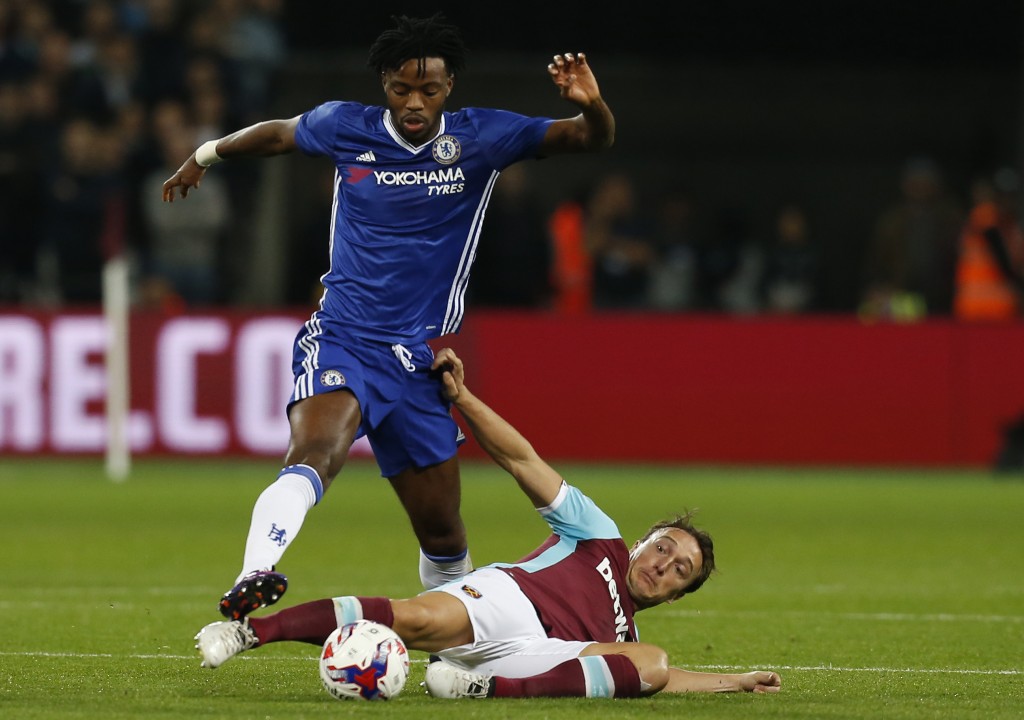Chelsea's English midfielder Nathaniel Chalobah (L) vies with West Ham United's English midfielder Mark Noble during the EFL (English Football League) Cup fourth round match between West Ham United and Chelsea at The London Stadium in east London on October 26, 2016. / AFP / Ian KINGTON / RESTRICTED TO EDITORIAL USE. No use with unauthorized audio, video, data, fixture lists, club/league logos or 'live' services. Online in-match use limited to 75 images, no video emulation. No use in betting, games or single club/league/player publications. / (Photo credit should read IAN KINGTON/AFP/Getty Images)