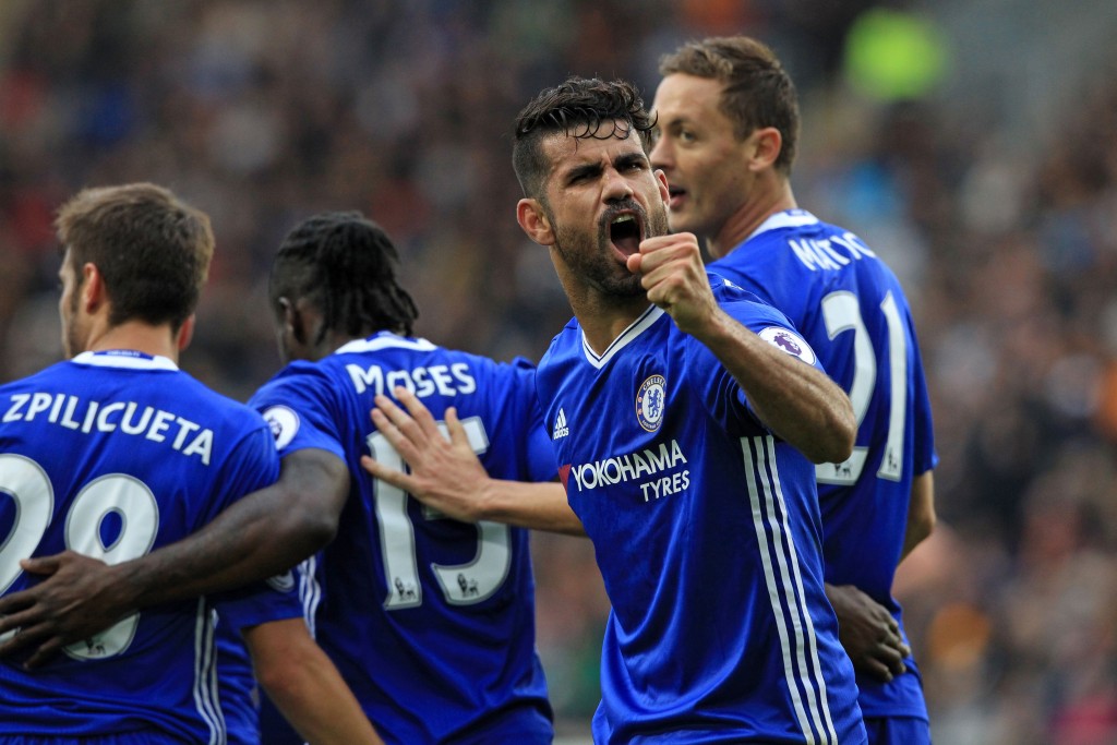 Chelsea's Brazilian-born Spanish striker Diego Costa (2nd R) celebrates scoring their second goal during the English Premier League football match between Hull City and Chelsea at the KCOM Stadium in Kingston upon Hull, north east England on October 1, 2016. (Photo by Lindsey Parnaby/AFP/Getty Images)