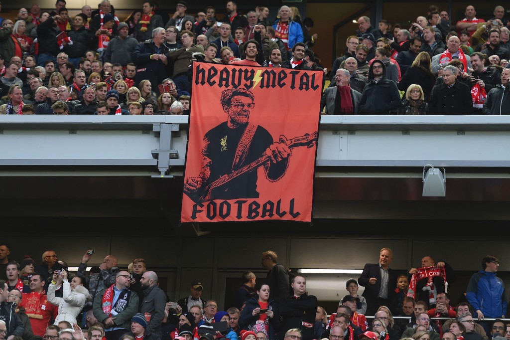 A banner showing a depiction of Liverpool's German manager Jurgen Klopp is seen during the English Premier League football match between Liverpool and West Bromwich Albion at Anfield in Liverpool, north west England on October 22, 2016. (Photo by PAUL ELLIS/AFP/Getty Images)