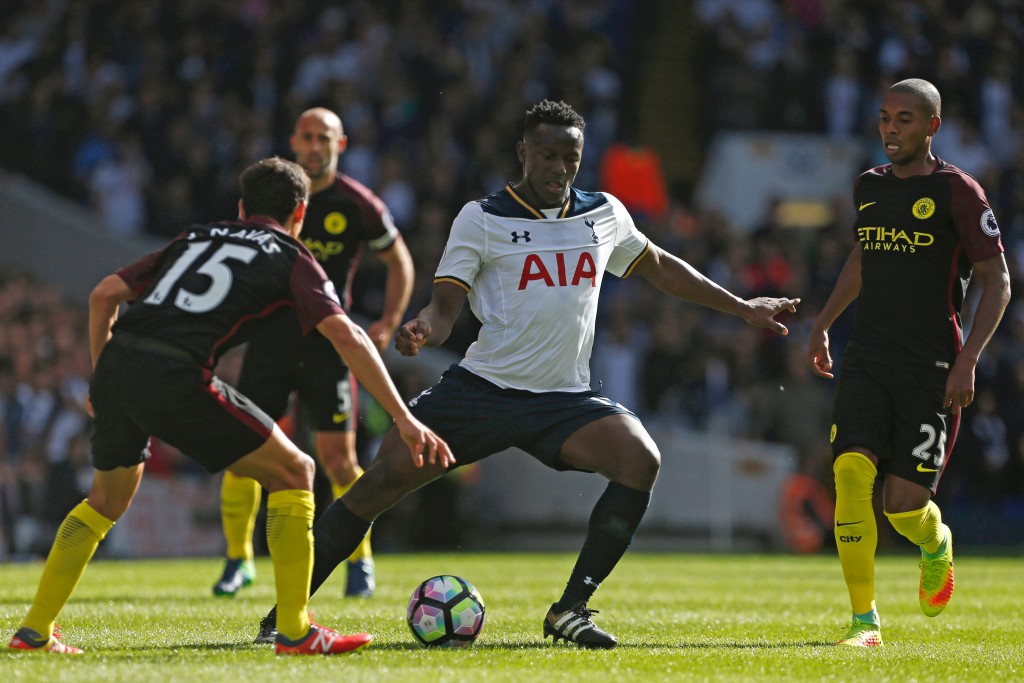 Tottenham Hotspur's Kenyan midfielder Victor Wanyama (2nd R) vies with Manchester City's Spanish midfielder Jesus Navas (L) and Manchester City's Brazilian midfielder Fernandinho (R) during the English Premier League football match between Tottenham Hotspur and Manchester City at White Hart Lane in London, on October 2, 2016. (Photo by Ian Kington/AFP/Getty Images)