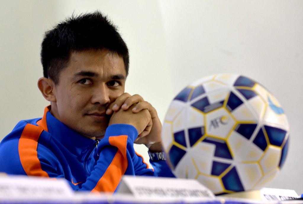 Indian footballer Sunil Chhetri gestures during a press conference by the Indian football team in Bangalore on November 11, 2015. India play Guam in the FIFA World Cup soccer qualifying match on November 12. AFP PHOTO/Manjunath KIRAN (Photo credit should read Manjunath Kiran/AFP/Getty Images)