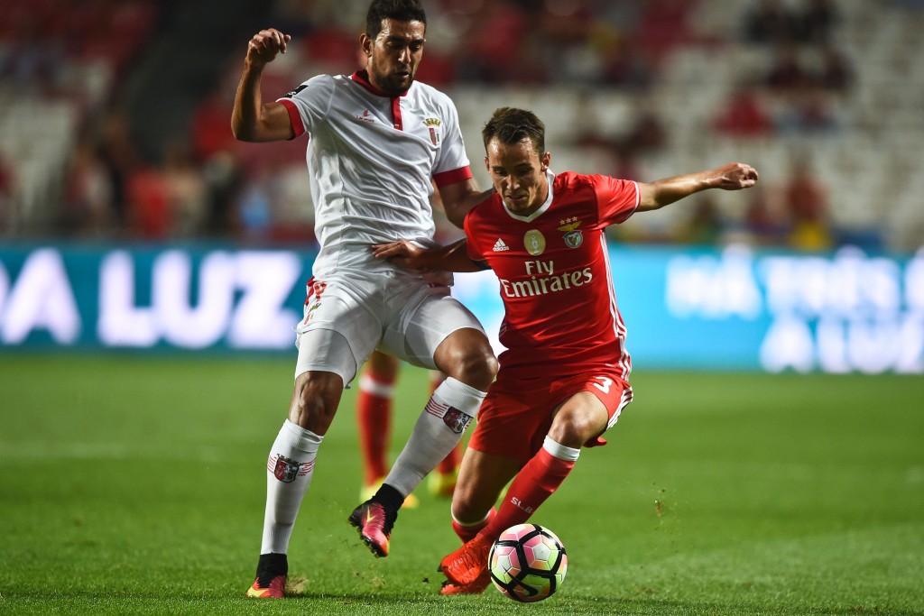 Benfica's Spanish defender Alex Grimaldo (R) vies with Braga's Egyptian forward Ahmed Hassan (L) during the Portuguese league football match SL Benfica vs Sporting Braga at the Luz stadium in Lisbon on September 19, 2016. / AFP / PATRICIA DE MELO MOREIRA (Photo credit should read PATRICIA DE MELO MOREIRA/AFP/Getty Images)