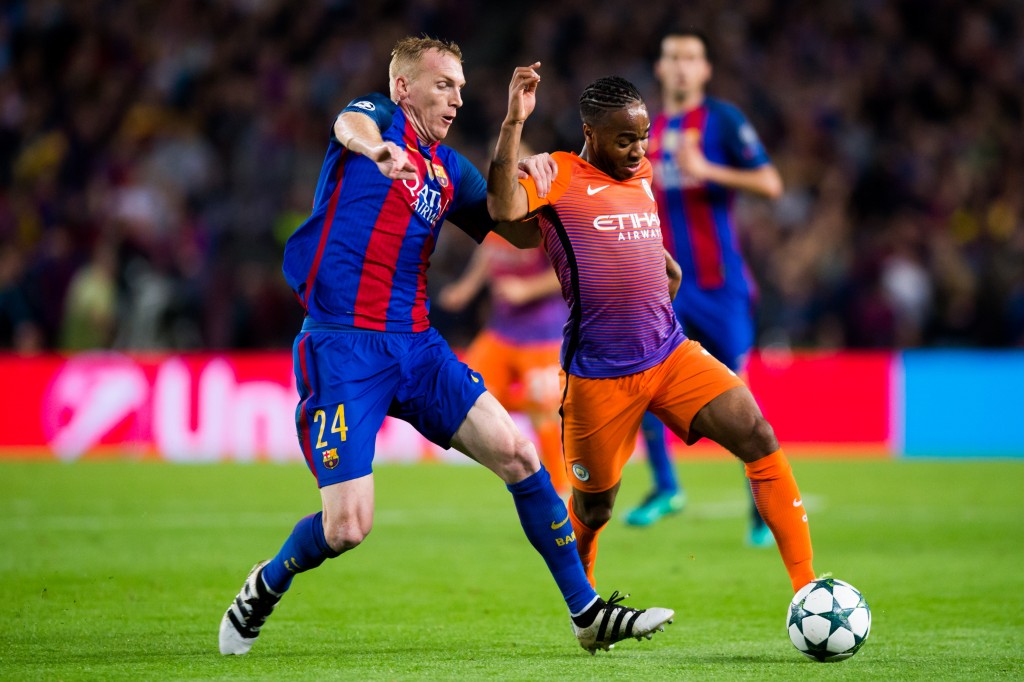 BARCELONA, SPAIN - OCTOBER 19: Jeremy Mathieu (L) of FC Barcelona fights for the ball with Raheem Sterling (R) of Manchester City FC during the UEFA Champions League group C match between FC Barcelona and Manchester City FC at Camp Nou on October 19, 2016 in Barcelona, Spain. (Photo by Alex Caparros/Getty Images)