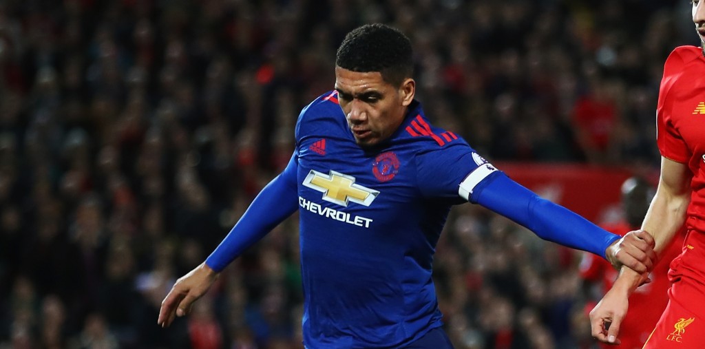 LIVERPOOL, ENGLAND - OCTOBER 17: Adam Lallana of Liverpool is challenged by Chris Smalling of Manchester United during the Premier League match between Liverpool and Manchester United at Anfield on October 17, 2016 in Liverpool, England. (Photo by Clive Brunskill/Getty Images)