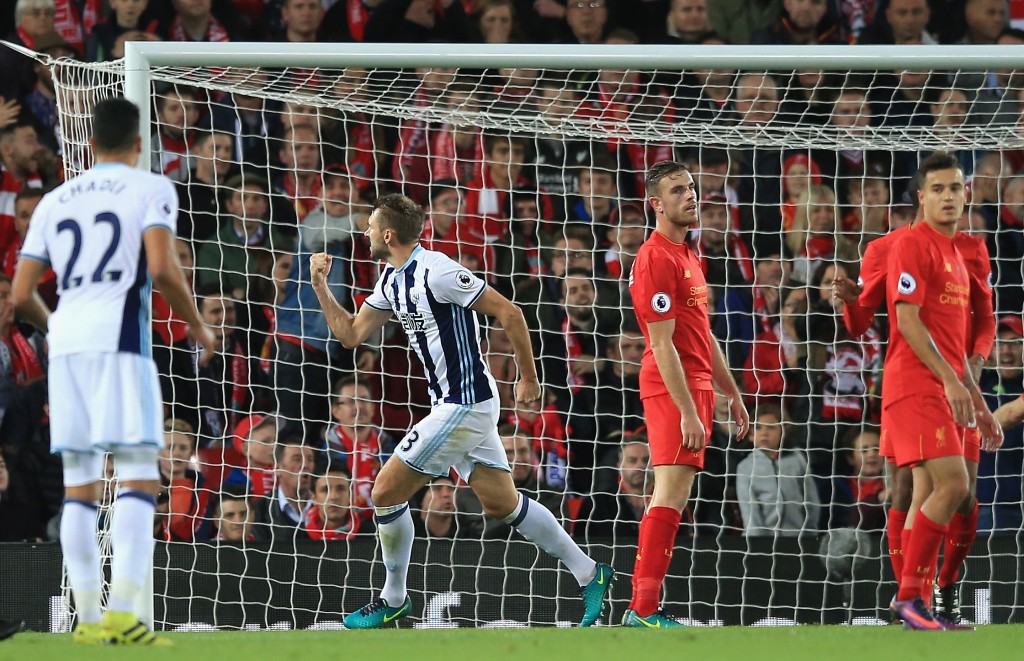 LIVERPOOL, ENGLAND - OCTOBER 22: Gareth McAuley (2nd L) of West Bromwich Albion celebrates after scoring a goal during the Premier League match between Liverpool and West Bromwich Albion at Anfield on October 22, 2016 in Liverpool, England. (Photo by Jan Kruger/Getty Images)