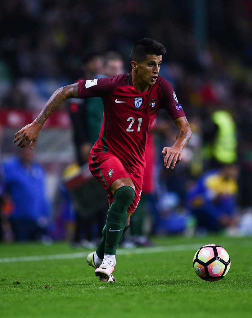 AVEIRO, PORTUGAL - OCTOBER 07: Joao Cancelo of Portugal runs with the ball during the FIFA 2018 World Cup Qualifier between Portugal and Andorra at Estadio Municipal de Aveiro on October 7, 2016 in Aveiro, Portugal. (Photo by David Ramos/Getty Images)